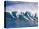 Surfers Ride a Wave at Waimea Beach on the North Shore of Oahu, Hawaii-null-Premier Image Canvas