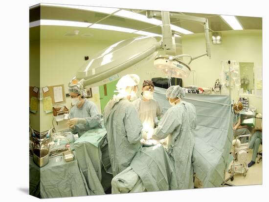 Surgeons Performing Operation-null-Premier Image Canvas