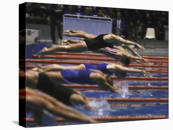 Swimmers Diving to Start a Race at Summer Olympics-null-Premier Image Canvas