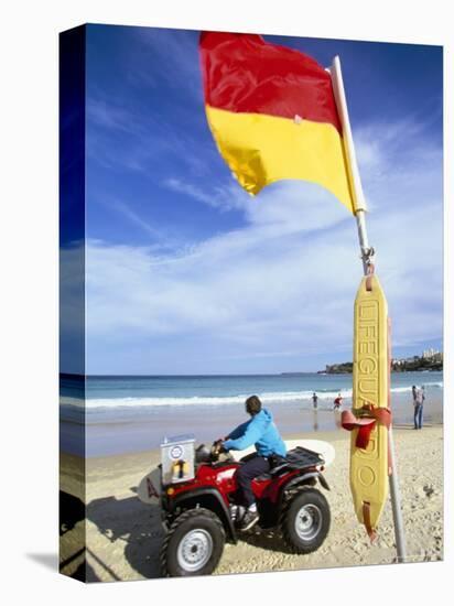 Swimming Flag and Patrolling Lifeguard at Bondi Beach, Sydney, New South Wales, Australia-Robert Francis-Premier Image Canvas