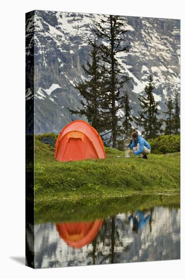 Switzerland, Canton Wallis, Bernese Oberland, Gro§e Scheidegg, Woman, Tent, Camping, Cook-Rainer Mirau-Premier Image Canvas