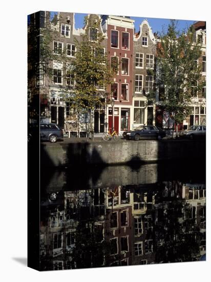 Tall Traditional Style Houses Reflected in the Water of a Canal, Amsterdam, the Netherlands-Richard Nebesky-Premier Image Canvas