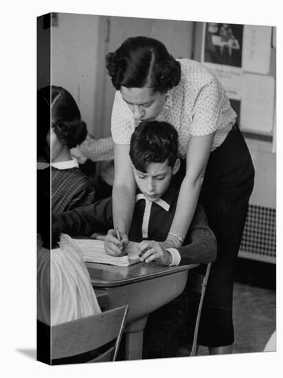 Teacher Correcting a Student's Grammar in a Book Report-Allan Grant-Premier Image Canvas