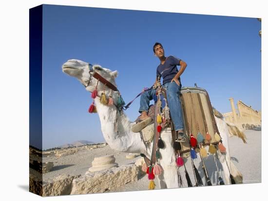 Teenage Boy on Camel in Front of the Great Colonnade, Palmyra, Syria, Middle East-Alison Wright-Premier Image Canvas