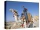 Teenage Boy on Camel in Front of the Great Colonnade, Palmyra, Syria, Middle East-Alison Wright-Premier Image Canvas