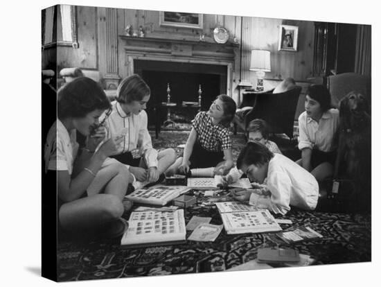 Teenage Girls Looking over their Stamp Albums-Yale Joel-Premier Image Canvas
