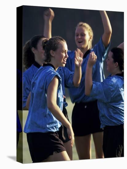 Teenage Girls on a Soccer Team Celebrating-null-Premier Image Canvas