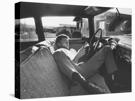 Teenager Robert Riesenmy Jr. Reading in Car at Home-Robert W^ Kelley-Premier Image Canvas