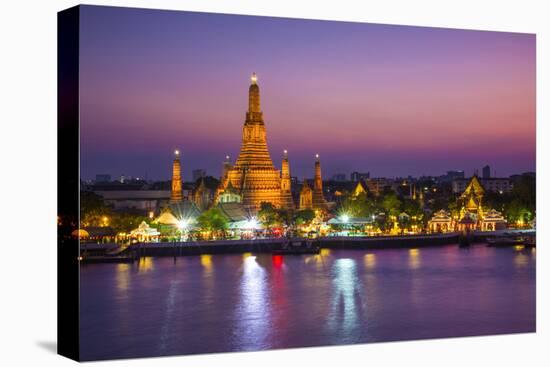 Temple of Dawn (Wat Arun) and Bangkok, Thailand-Jon Arnold-Premier Image Canvas