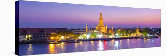 Temple of Dawn (Wat Arun) and Bangkok, Thailand-Jon Arnold-Premier Image Canvas