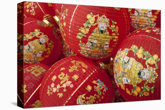 Thailand, Bangkok, Paper lanterns in a pile before being hung for festival.-Merrill Images-Premier Image Canvas