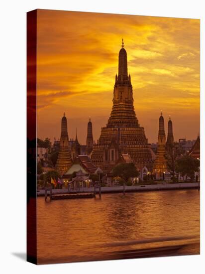 Thailand, Bangkok, Wat Arun ,Temple of the Dawn and Chao Phraya River Illuminated at Sunset-Gavin Hellier-Premier Image Canvas