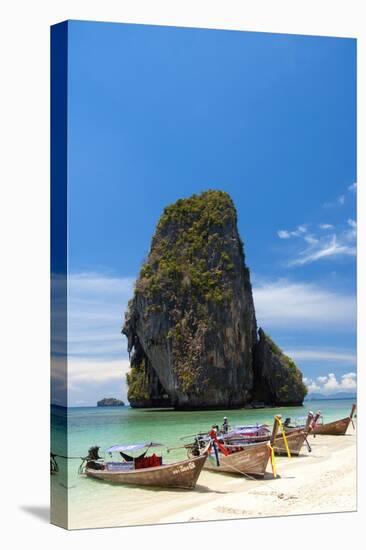 Thailand: Tour boats lined up on the beach at Hat Tham Phra Nang, Krabi Coast-null-Premier Image Canvas