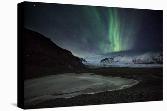 The Aurora Borealis over a Glacier in the Skaftafell National Park in Iceland-Alex Saberi-Premier Image Canvas