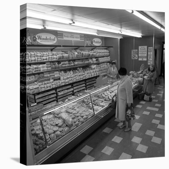 The Bakery Counter at the Asda Supermarket in Rotherham, South Yorkshire, 1969-Michael Walters-Stretched Canvas