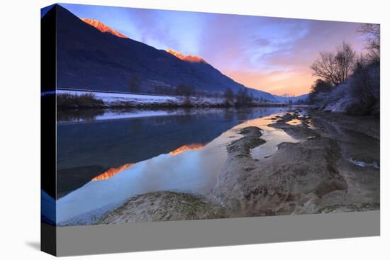 The colors of sunset are reflected in the Adda River, Valtellina, Lombardy, Italy, Europe-Francesco Bergamaschi-Premier Image Canvas