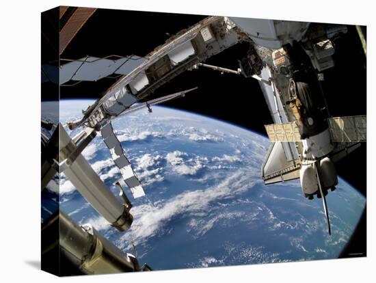 The Docked Space Shuttle Atlantis (STS-115) and a Soyuz Spacecraft-Stocktrek Images-Premier Image Canvas