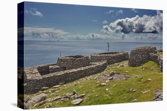 The Fahan group of beehive huts, on the southwest coast of the Dingle Peninsula, near Slea Head, Co-Nigel Hicks-Premier Image Canvas