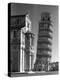 The Famed Leaning Tower of Pisa Standing Beside the Baptistry of the Cathedral-Margaret Bourke-White-Premier Image Canvas