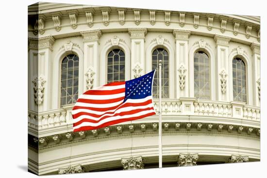 The Flag of the USA Flying in Front of the Capitol Building in Washington, Dc.-Gary Blakeley-Premier Image Canvas