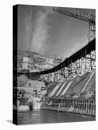 The Grand Coulee Dam under Construction with a Sign in the Bkgrd. That Says: "Safety Pays"-Alfred Eisenstaedt-Premier Image Canvas
