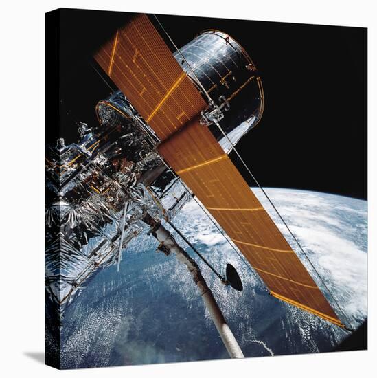 The Hubble Space Telescope Backdropped by Planet Earth-null-Premier Image Canvas