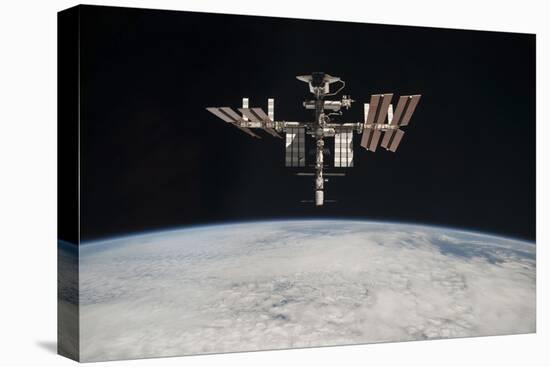 The International Space Station in Orbit Above Earth-null-Premier Image Canvas
