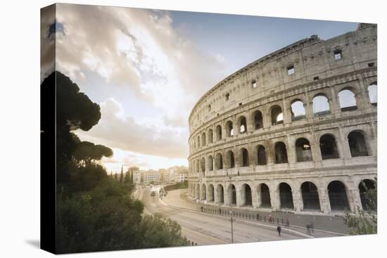 The lights of sunrise frame the ancient Colosseum (Flavian Amphitheatre), UNESCO World Heritage Sit-Roberto Moiola-Premier Image Canvas
