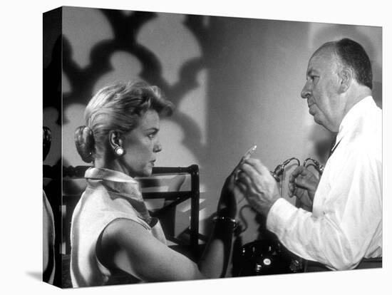 THE MAN WHO KNEW TOO MUCH, 1956 On the set, Alfred Hitchcock directs Doris Day (b/w photo)-null-Stretched Canvas