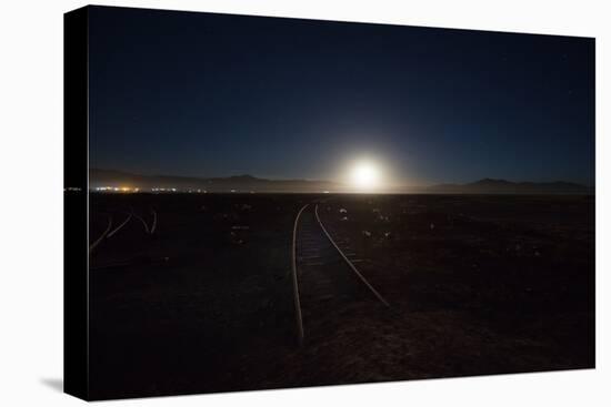 The Moon Rises over a Dead Train Line in Uyuni-Alex Saberi-Premier Image Canvas