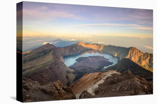 The Mt. Rinjani Crater and a Shadow Cast from the Peak at Sunrise-John Crux-Premier Image Canvas