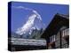 The Peak of the Matterhorn Mountain Towering Above Chalet Rooftops, Swiss Alps, Switzerland-Ruth Tomlinson-Premier Image Canvas