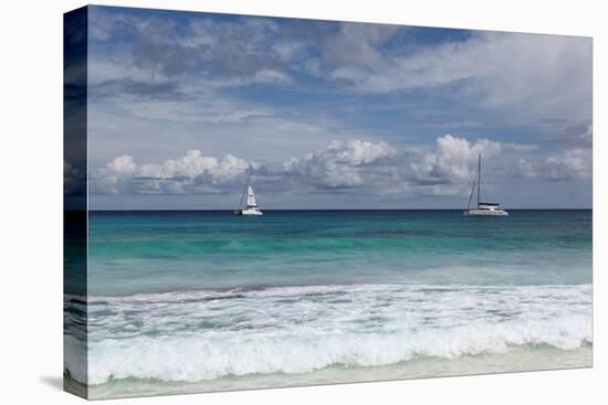 The Seychelles, La Digue, Anse Coco, Two Catamaran Yachtsmen-Catharina Lux-Premier Image Canvas