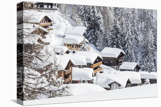 The Snowy Woods Frame the Typical Mountain Huts, Bettmeralp, District of Raron-Roberto Moiola-Premier Image Canvas