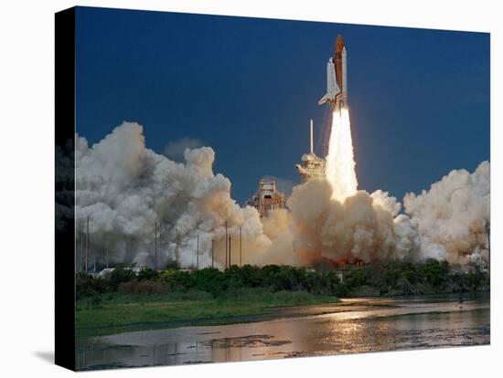 The Space Shuttle Discovery Rises from the Swamps Surrounding its Pad at Kennedy Space Center-null-Premier Image Canvas