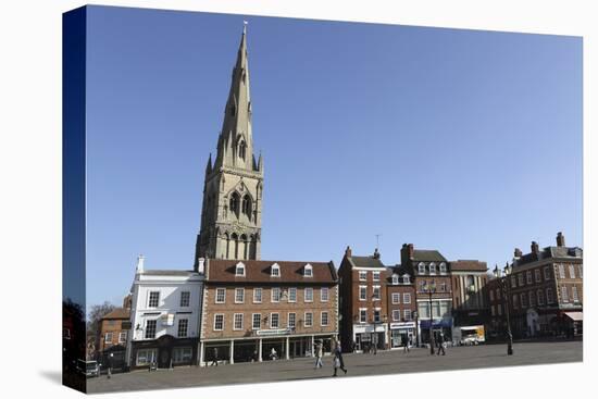 The Spire of St. Mary Magdalene Church Rises over Building on the Market Square-Stuart Forster-Premier Image Canvas