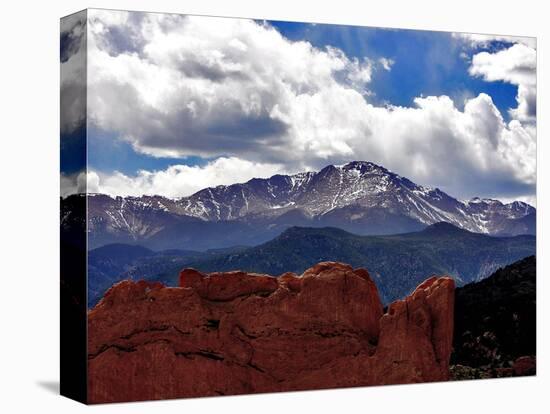 The Sun Breaks Through the Clouds to Highlight the Summit of Pikes Peak-null-Premier Image Canvas