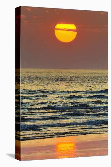 The Sun Setting Off Playa Guiones Surf Beach-Rob Francis-Premier Image Canvas