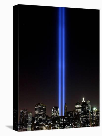 The Tribute of Light Memorial Shines into the Sky Over the Night Skyline of New York City-null-Premier Image Canvas