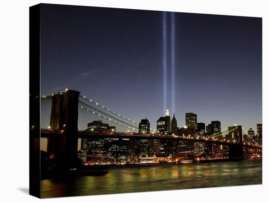 The Tribute of Light Memorial Shines into the Sky Over the Night Skyline of New York City-null-Premier Image Canvas