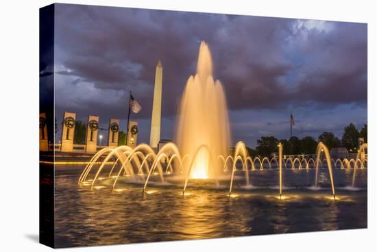 The Washington Monument Lit Up at Night as Seen from the World War Ii Monument-Michael Nolan-Premier Image Canvas