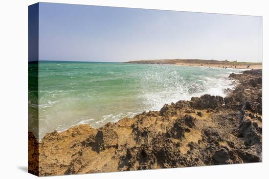 The waves of turquoise sea crashing on the rocks, Pozzallo, Province of Ragusa, Sicily, Italy, Medi-Roberto Moiola-Premier Image Canvas