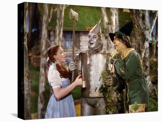 The Wizard of Oz, from Left: Judy Garland, Jack Haley, Ray Bolger, 1939-null-Stretched Canvas