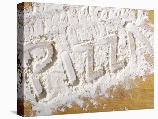 The Word 'PIZZA' Written in Flour-Yehia Asem El Alaily-Premier Image Canvas