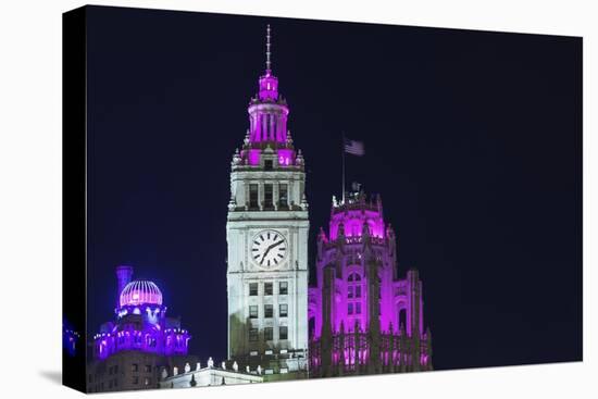 The Wrigley Building and Tribune Tower Illuminated at Night, Chicago, Illinois.-Jon Hicks-Premier Image Canvas