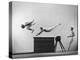 Three Men of Danish Gymnastic Team Performing a Tiger Leap-Gjon Mili-Premier Image Canvas