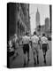 Three Young Businessmen Wearing Bermuda Shorts as They Walk Along Fifth Ave. During Lunchtime-Lisa Larsen-Premier Image Canvas