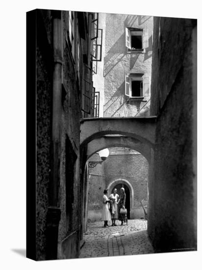 Three Young Women Chatting in Cobbled Alleyway of Old Section of Salzburg-Alfred Eisenstaedt-Premier Image Canvas
