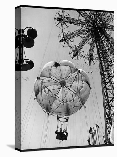 Thrillseeking Couple Take a Ride on the 300-Ft. Parachute Jump at Coney Island Amusement Park-null-Premier Image Canvas