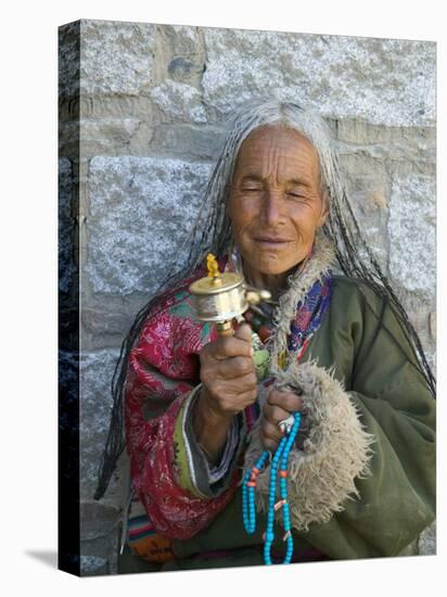 Tibetan Woman Holding Praying Wheel in Sakya Monastery, Tibet, China-Keren Su-Premier Image Canvas